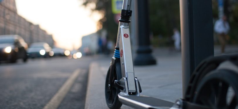 scooter parked brand hidden - Unsplash