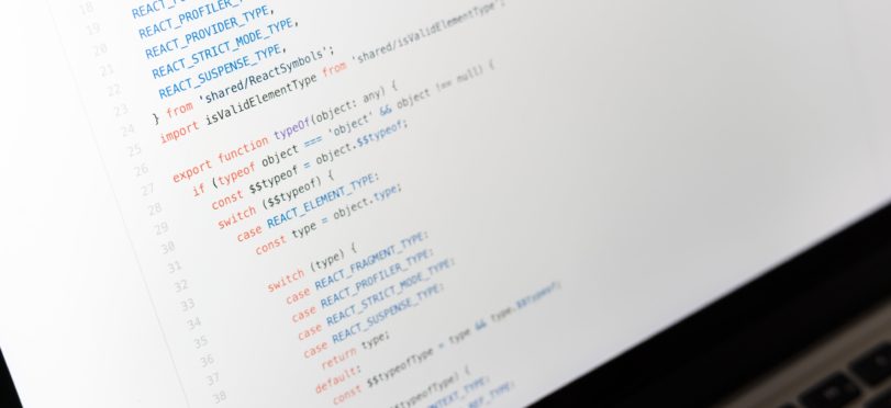github code close-up white screen - Unsplash