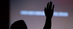 Raised hand - Unsplash